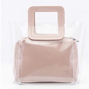 Structured transparent tote with removable pouch